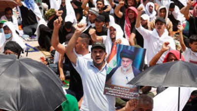 ميليشا "كتائب حزب الله" تهدد بالنزول إلى الشارع