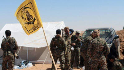 "فاطميون" الأفغانية تطرد ميليشيا للنظام من مقر في البوكمال