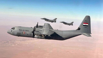 بالصور: عمليات تركيب شباك جديد لمرقد "السيدة زينب" في ريف دمشق والعراق يستخدم طائرات "اف 16"