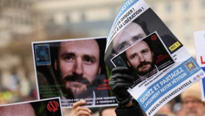 بلجيكا تدعو الرئيس الإيراني للإفراج عن عامل إغاثة تحتجزه طهران