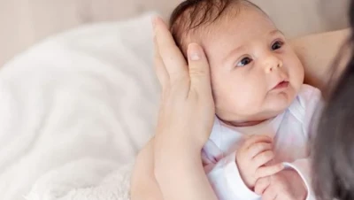 تفسير حلم حمل طفل رضيع للعزباء والمتزوجة والحامل